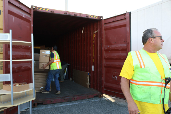 Port Employees Unloading Cargo