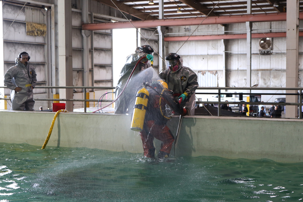 stration of contaminated diving and decontamination procedures by NAVFAC EXWC (Naval Facilities Engineering and Expeditionary Warfare Center) at ANTX