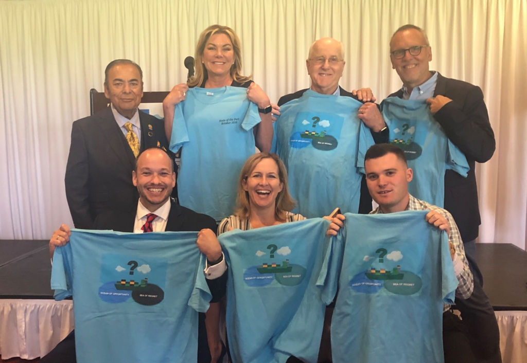 Attendees pose with their “Ocean of Opportunity” shirts after the State of the Port address