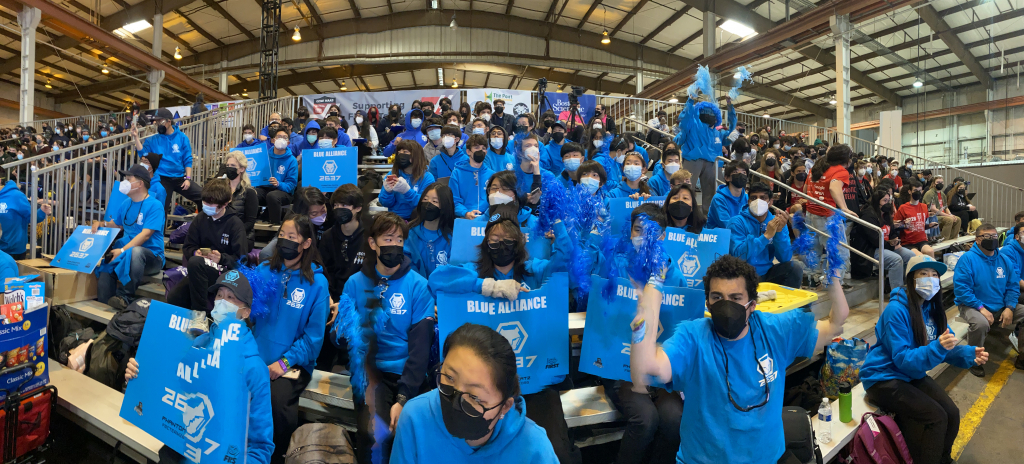 Student teams rooting on the robots during the competition held at the Port of Hueneme